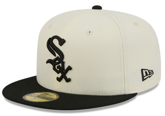 A New Era 59FIFTY fitted baseball cap in off-white and black, featuring the Chicago White Sox logo on the front and a black flat brim.