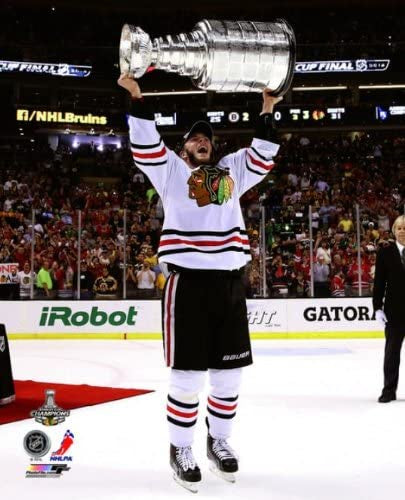 Jonathan Toews Chicago Blackhawks 2013 Stanley Cup Champions Raising Of The Cup Photo - Pro Jersey Sports