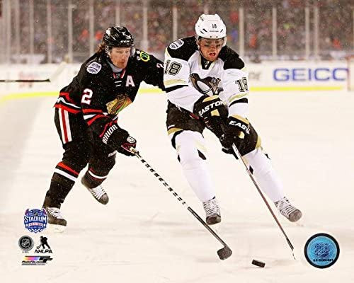 Duncan Keith Chicago Blackhawks & James Neal Pittsburgh Penguins 2014 NHL Stadium Series Action Photo - Pro Jersey Sports
