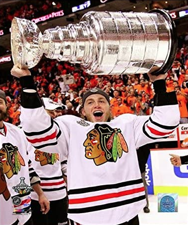 Patrick Kane Chicago Blackhawks 2010 Stanley Cup Champions Raising The Cup Photo - Pro Jersey Sports