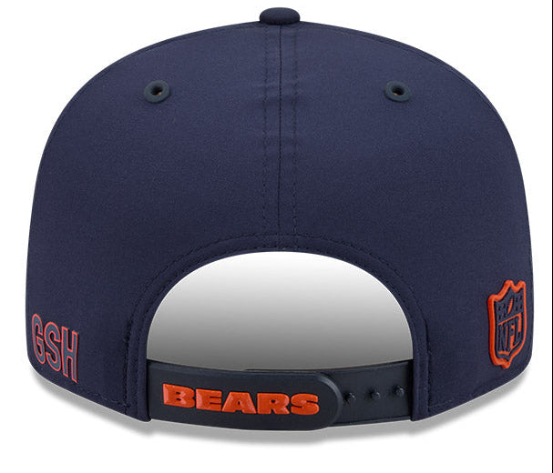 A navy blue Chicago Bears baseball cap shown from the back, featuring an adjustable strap with 'BEARS' in orange and red, along with team logos on the sides.