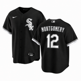 Black Chicago White Sox baseball jersey shown from both front and back. The front features the team's 'Sox' logo on the left chest and a white Nike swoosh on the right chest.