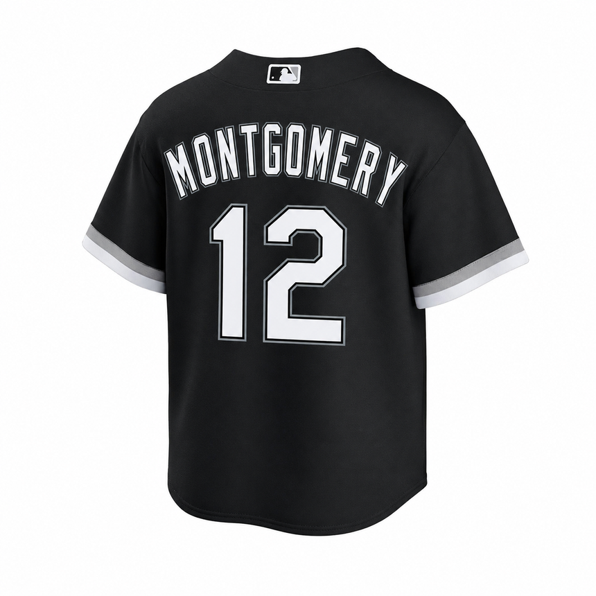 Black short-sleeve baseball jersey shown from the back, featuring 'MONTGOMERY' and the number '12' in white with black outlines, plus white sleeve trim. A small MLB logo is visible at the collar.