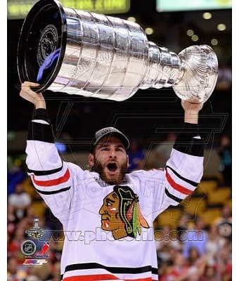 Brandon Saad Chicago Blackhawks 2013 Stanley Cup Champions Raising Of The Cup Photo (Size: 8X10)