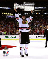 Jonathan Toews Chicago Blackhawks 2013 Stanley Cup Champions Raising Of The Cup Photo - Pro Jersey Sports